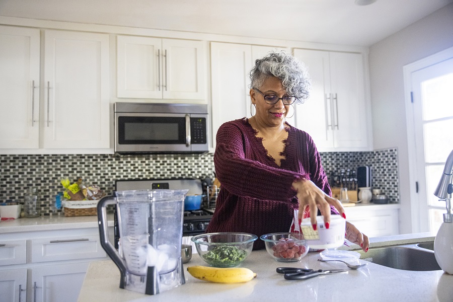 Beautiful Black Woman Having a Smoothie